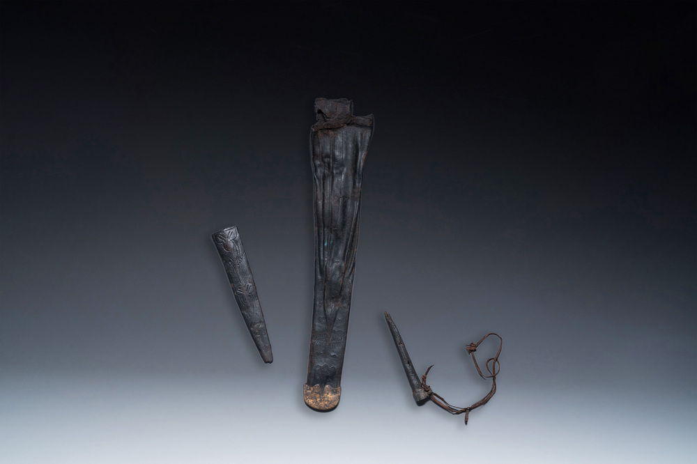 Three scabbards for daggers in leather with copper and pewter mounts, Low Countries, 14/15th C.