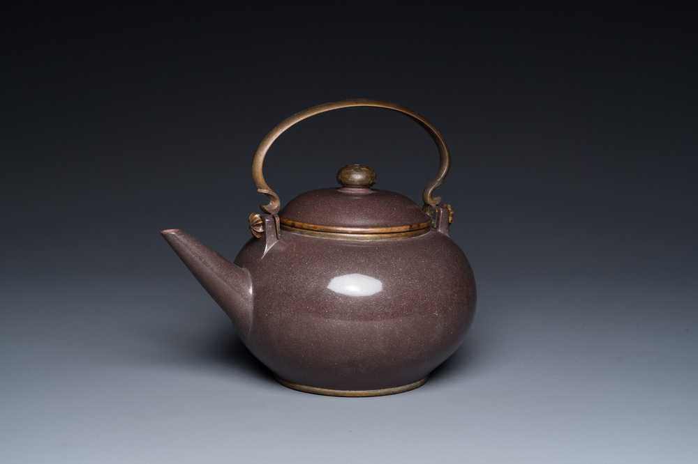 A Chinese polished purple Yixing stoneware teapot and cover for the Thai market, Gong Ju 貢局 mark, 19th C.