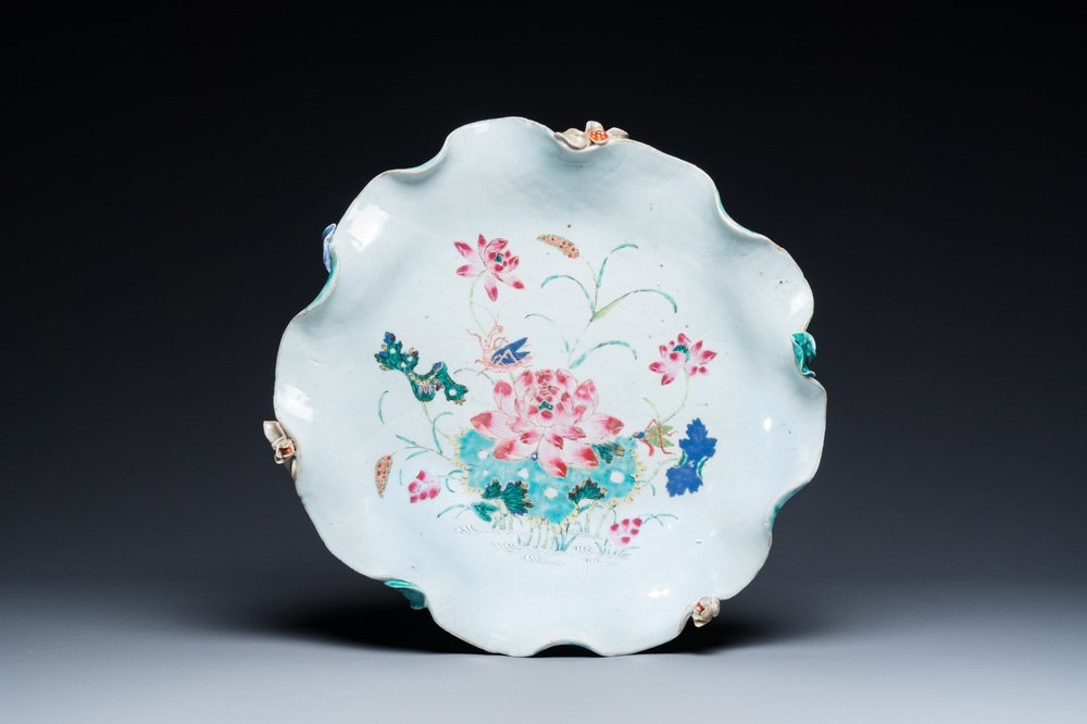 Een grote Chinese famille rose 'lotus' schotel met reli&euml;fdecor, Yongzheng/Qianlong