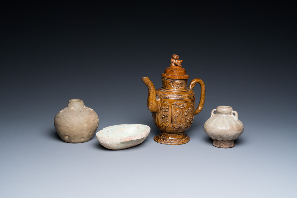 A Chinese qingbai-glazed ear cup, two celadon jarlets and a brown-glazed jug and cover, Han and later