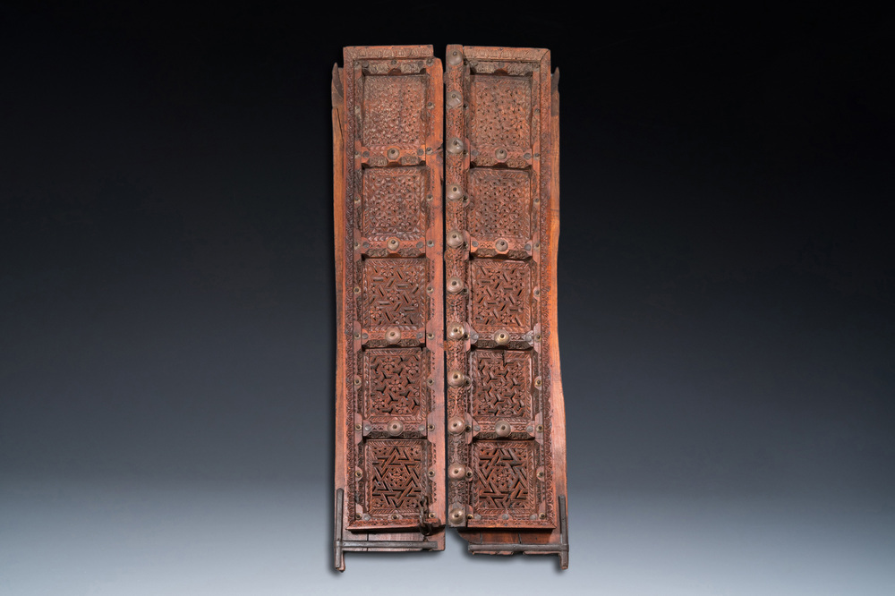 A pair of reticulated wooden doors with geometrical patterns, Northern Africa, 19th C.