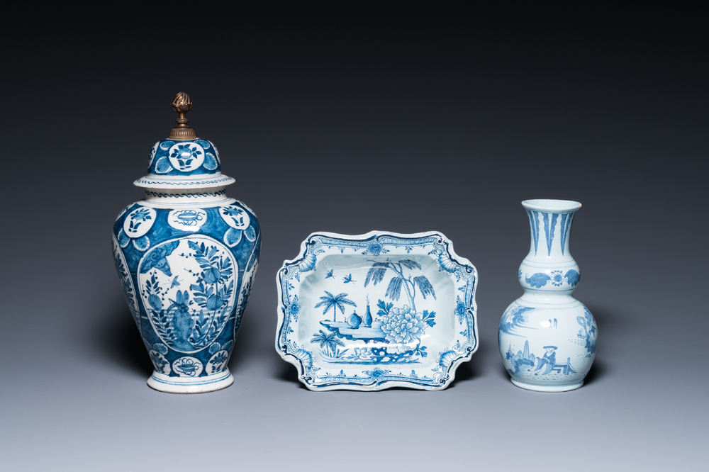 Two Dutch Delft blue and white chinoiserie vases and a deep salad bowl, 17/18th C.