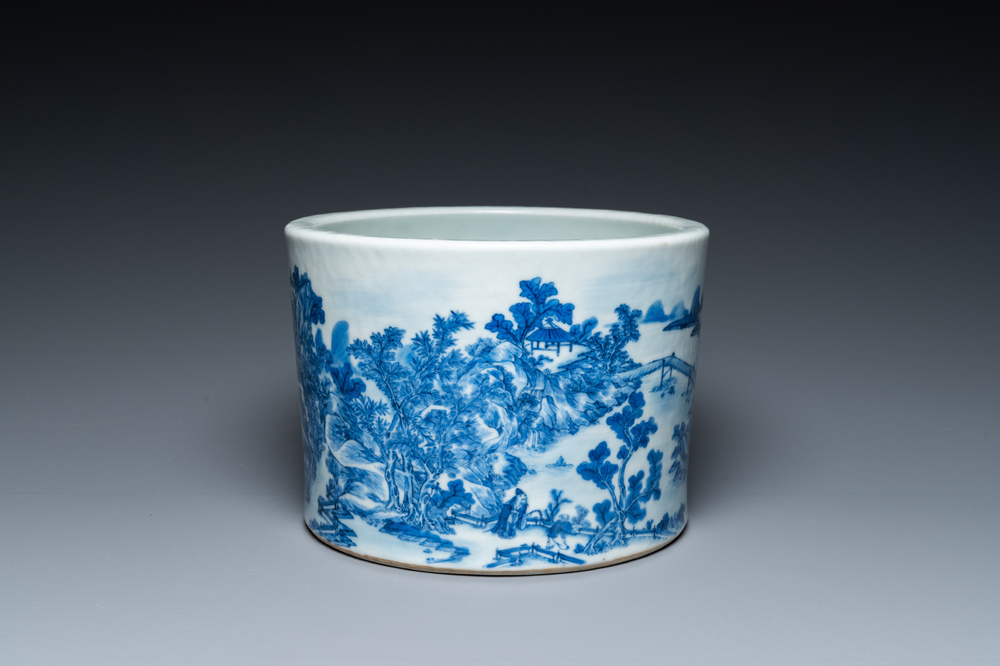 A large Chinese blue and white brush pot with a refined mountainous landscape, 18th C.