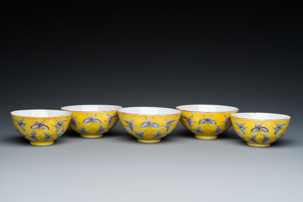 Five Chinese famille rose yellow-ground 'butterfly' bowls, Tongzhi mark and of the period