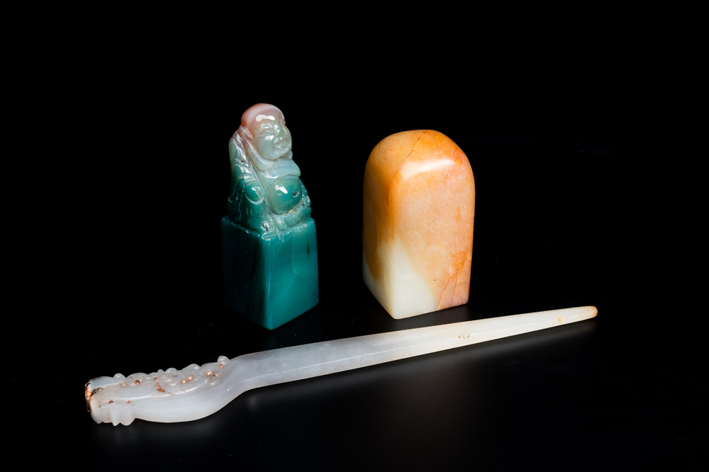 A Chinese white jade hairpin and two jade seal stamps, Qing
