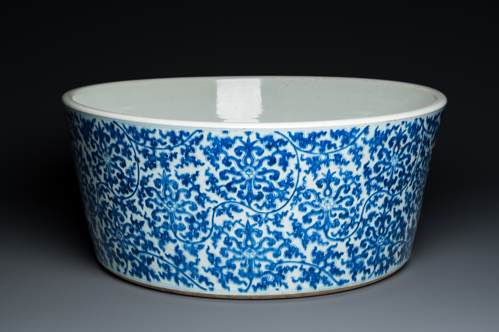 An exceptionally large Chinese blue and white basin with floral scrolls, Kangxi