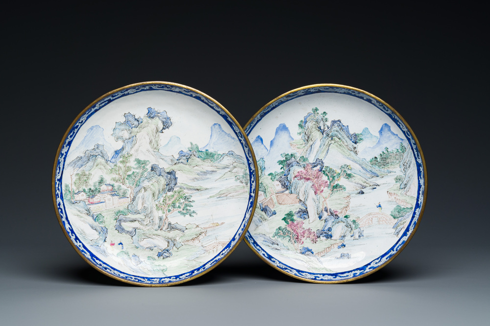 A pair of Chinese Canton enamel 'Master of the Rocks' plates, Yongzheng/Qianlong