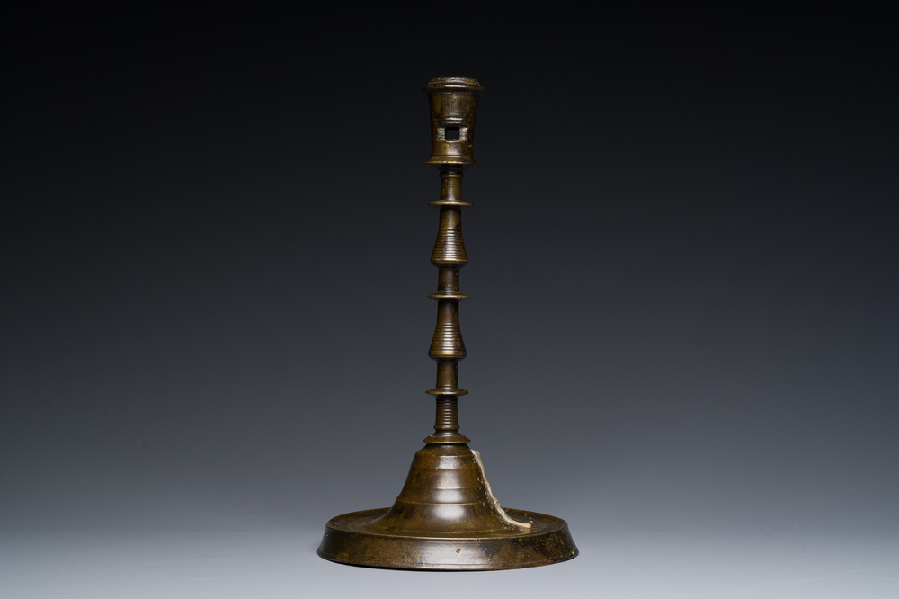 An exceptionally large bronze candlestick, Flanders or France, 15/16th C.