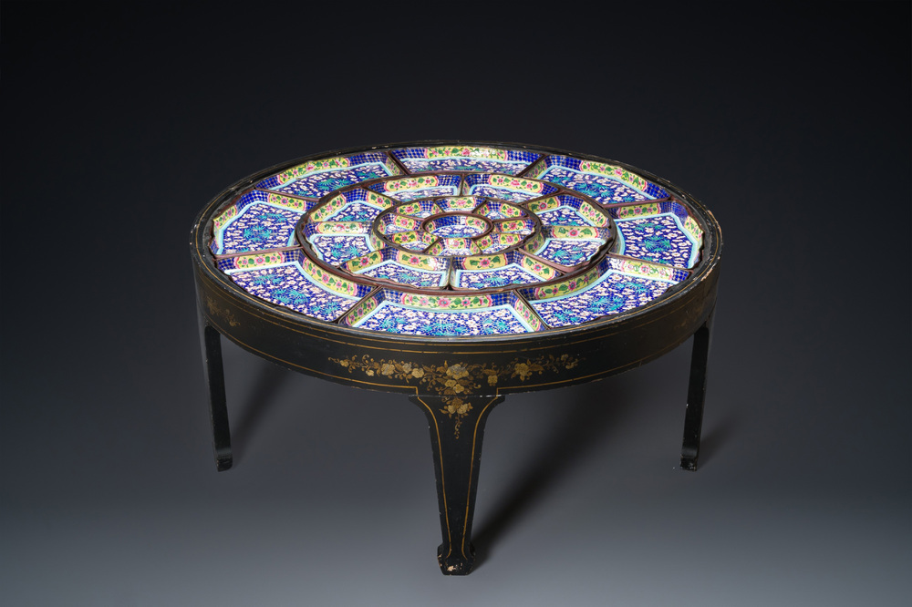 An exceptionally large Chinese Canton enamel rice table or sweetmeat set in its original Canton gilt-lacquered presentation table, 18/19th C.