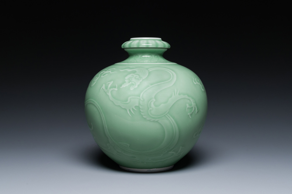 A Chinese monochrome celadon-glazed 'dragon' vase, 19th C.