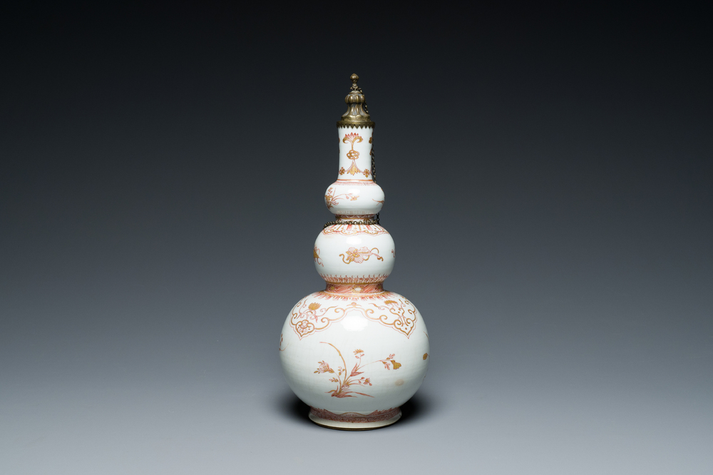 A Chinese iron-red and gilt-decorated triple gourd vase, Kangxi