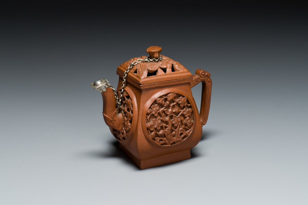 A Chinese reticulated double-walled Yixing stoneware teapot and cover, Kangxi