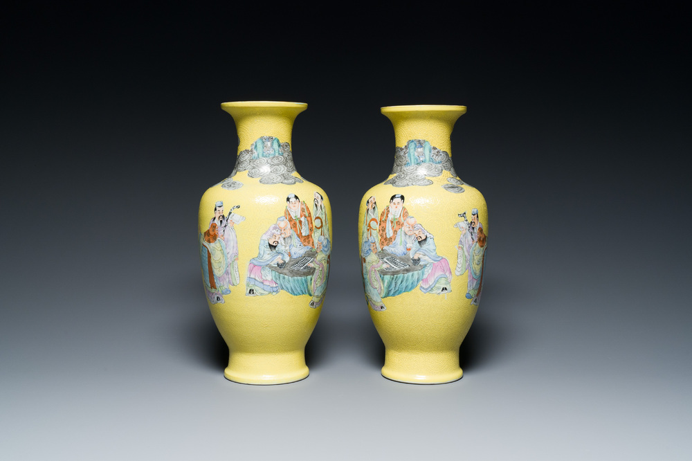 A pair of Chinese famille rose yellow sgraffiato ground 'sages' vases, Qianlong mark, Republic