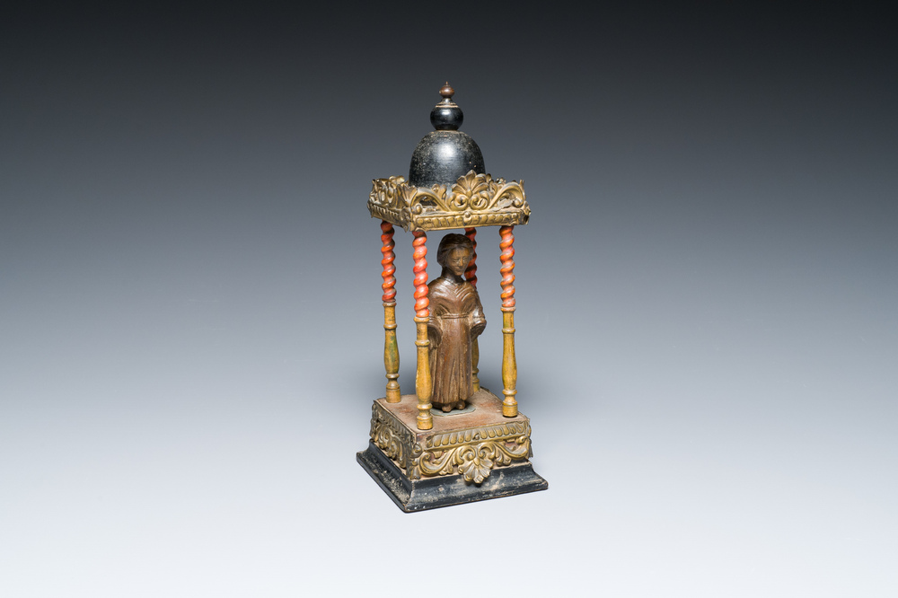 An Italian carved wood figure of a monk mounted in a later pagoda, 14th and 19th C.