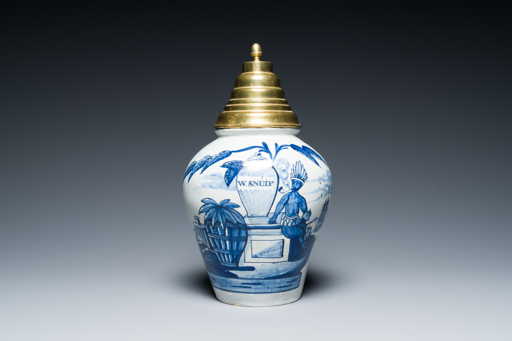 A Dutch Delft blue and white 'VOC' tobacco jar with an Indian and inscribed 'W.Snuif', 18th C.