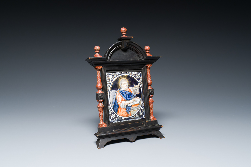 A Limoges enamel plaque depicting Saint Luke in an attractive frame, France, 17/18th C.
