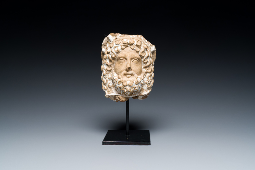 A Punic terracotta head of Serapis with traces of white engobe, Northern Africa, 2nd C. b.C.