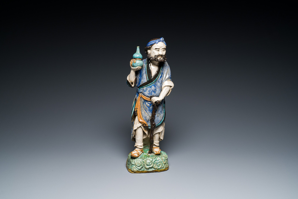 A large Chinese polychrome Shiwan pottery figure of Li Tieguai, 19th C.
