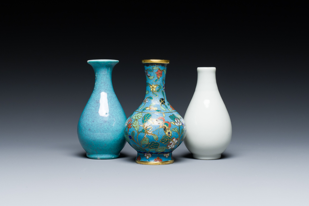 Three small Chinese bottle vases in cloisonn&eacute;, white and robin's-egg-glazed porcelain, 19/20th C.