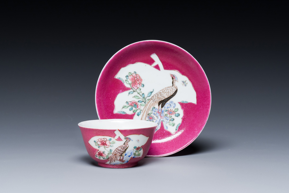 A Chinese famille rose ruby-pink-ground 'pheasants' cup and saucer, Yongzheng