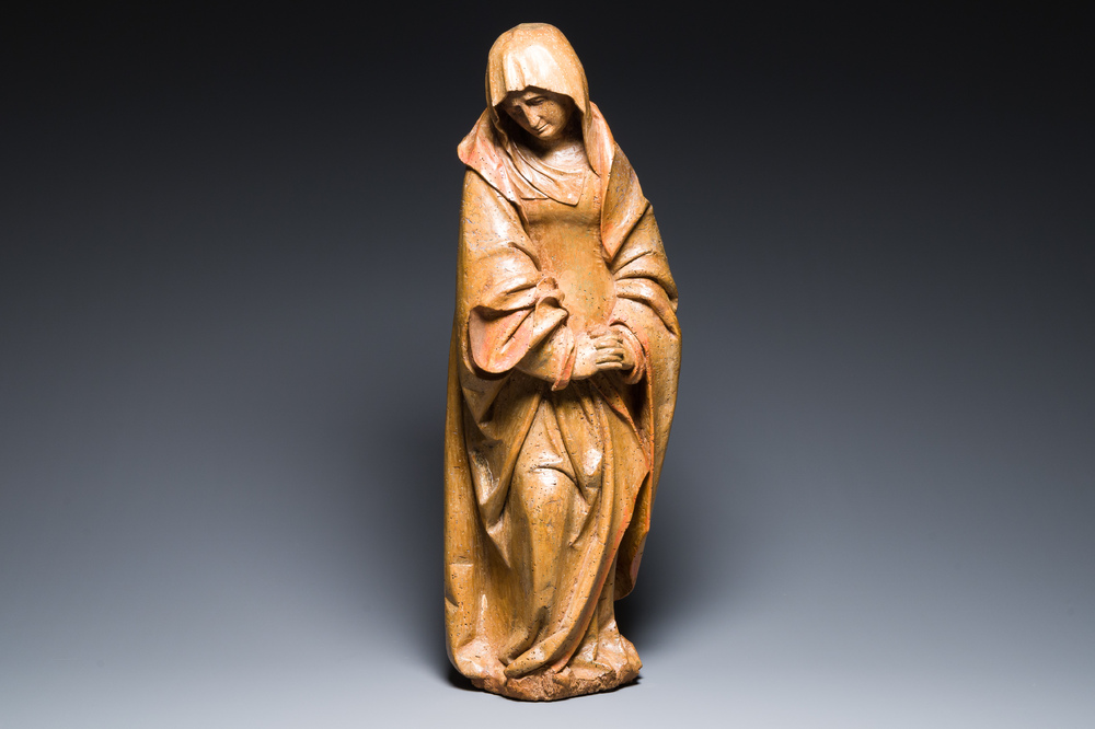 A Flemish walnut sculpture of Mary, 16th C.