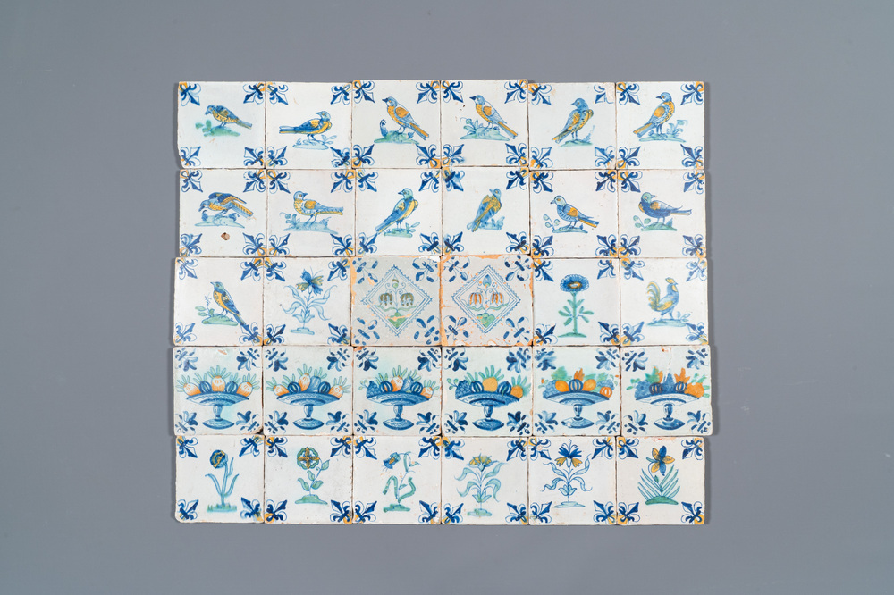 30 polychrome Dutch Delft tiles with birds, flowers and tazzas with fruits, 17th C.