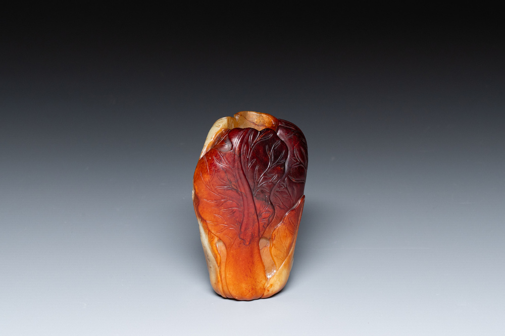 A small Chinese white and russet jade 'cabbage' vase, 19th C.