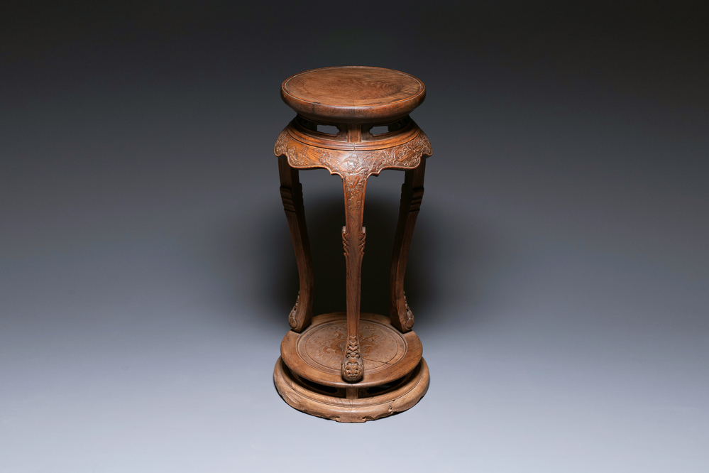 A Chinese wood circular incense stand with mythic animals, 'xiangji', Ming
