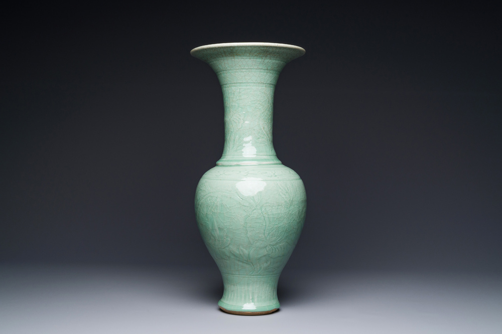 A Chinese Longquan celadon baluster vase with anhua floral design, Ming