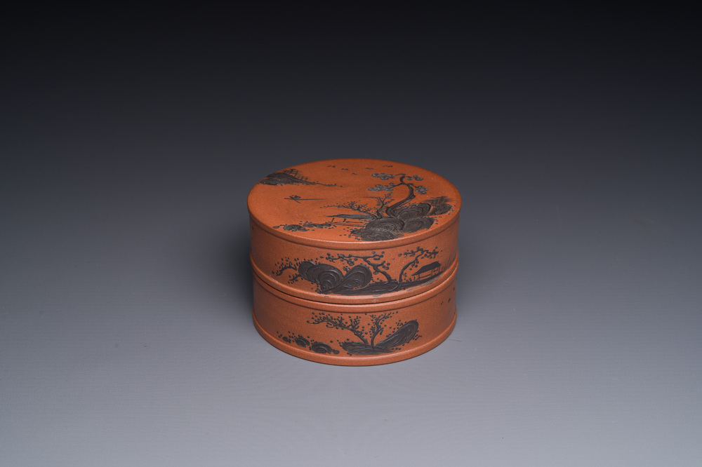 A Chinese blue-enameled Yixing stoneware box and cover with a mountainous landscape, 18/19th C.