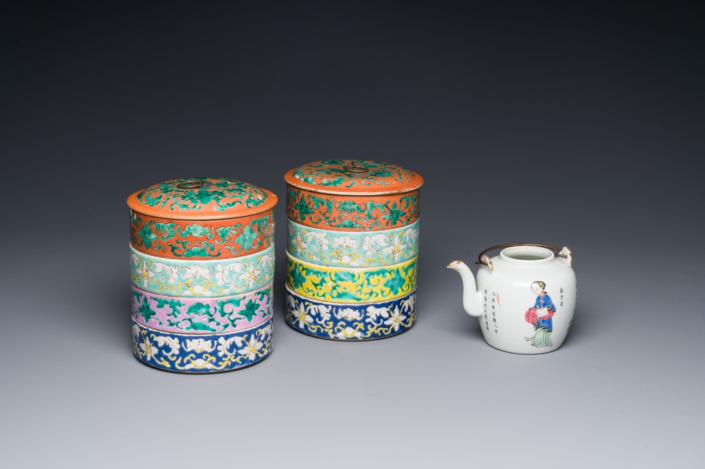 A pair of Chinese famille rose four-tier stacking boxes and a teapot, 19th C.