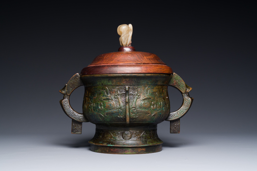 An unusual Chinese archaistic bronze censer with wooden cover, 'gui', Song