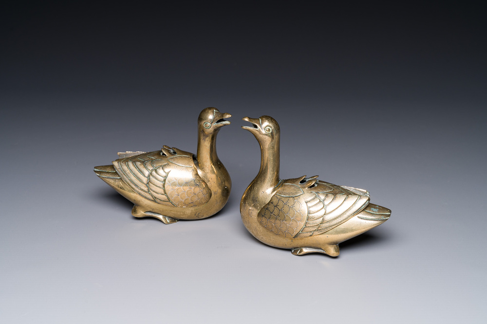 A pair of Chinese silver-inlaid bronze duck-shaped water droppers, Qing