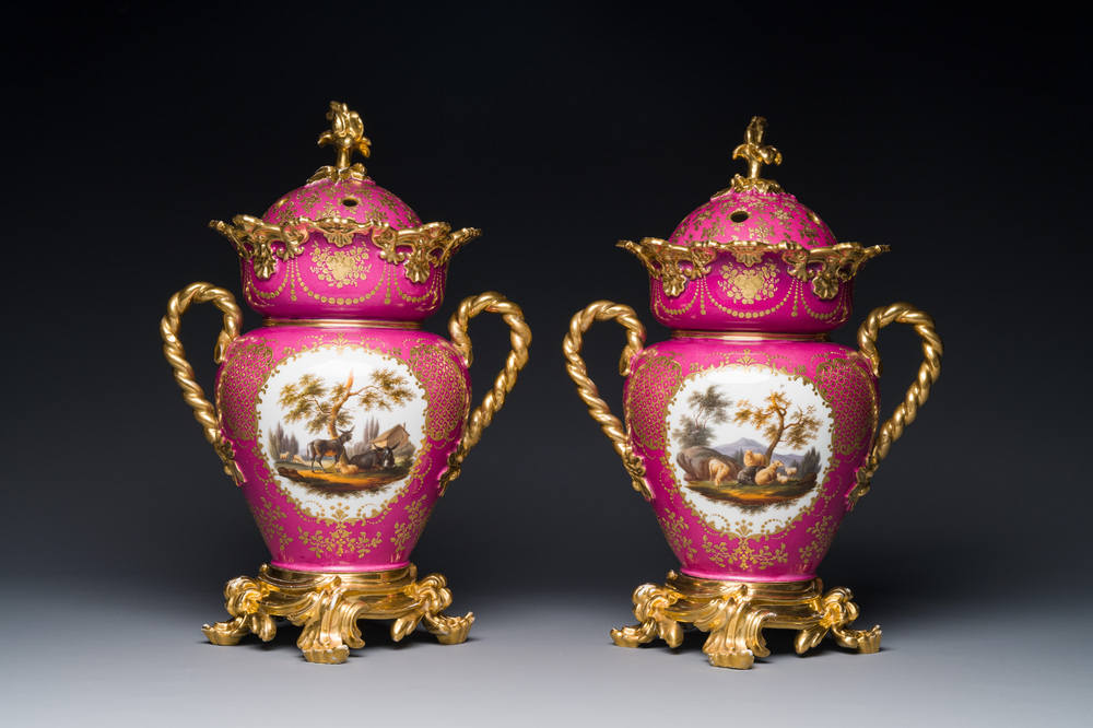 A pair of French parcel-gilt polychrome pink-ground porcelain potpourri vases, Jacob Petit, Paris, 19th C.