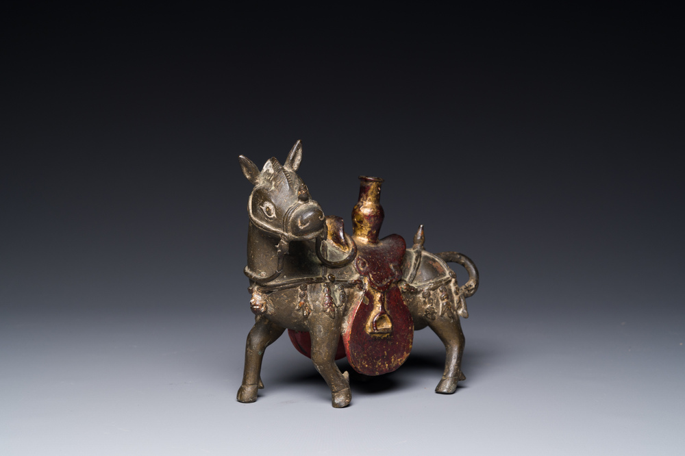 A rare Chinese partly lacquered and gilt bronze incense holder in the shape of a horse, Yuan/early Ming