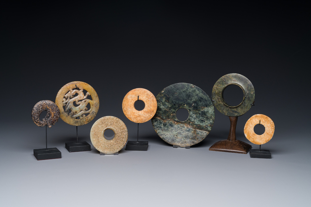 A varied collection of 'bi' discs and jade pendants, China, 1st C. B.C. and earlier