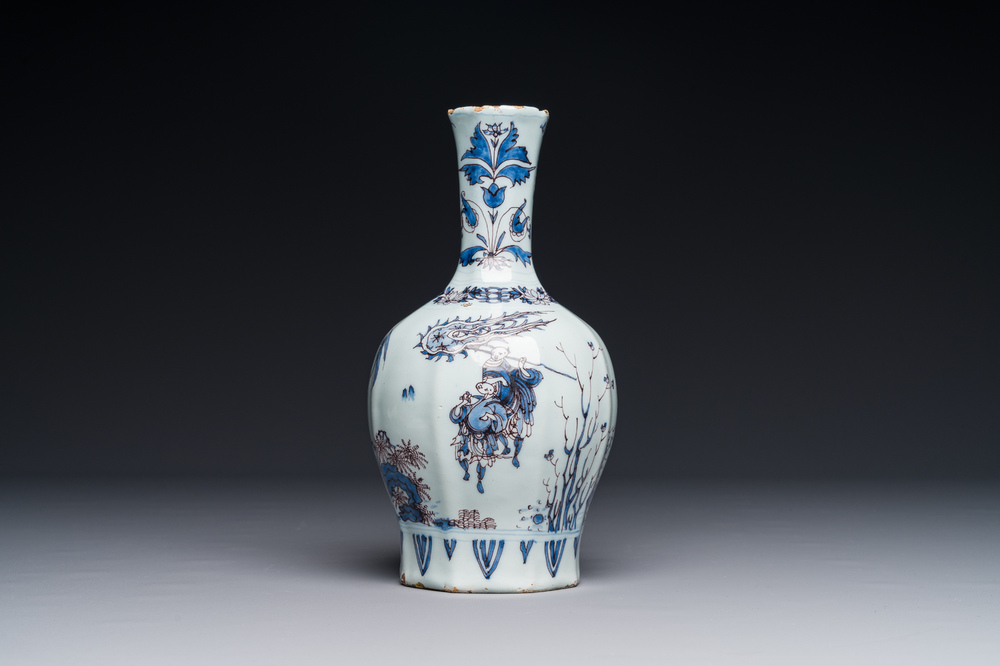 A fine Dutch Delft blue, white and manganese chinoiserie bottle vase, late 17th C.
