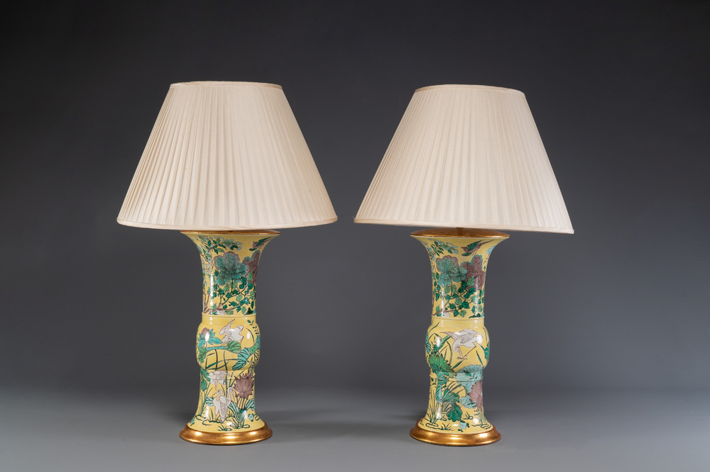 A pair of Chinese verte biscuit 'gu' vases with gilt bronze lamp mounts, 19th C.