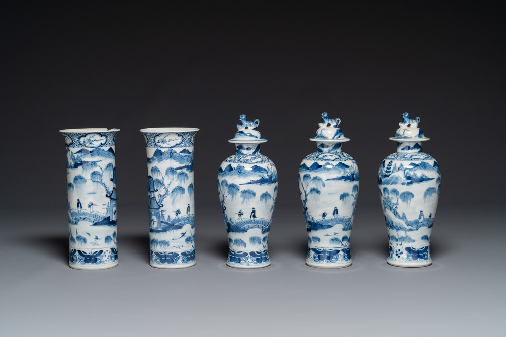 A Chinese blue and white garniture of five vases with landscape design, 19th C.