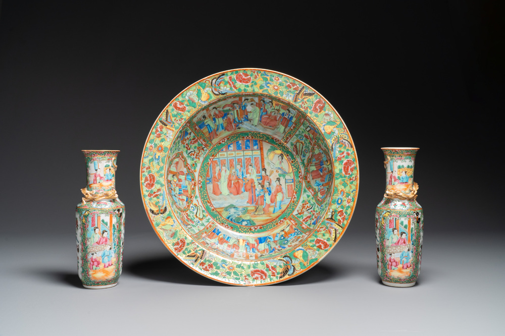 A Chinese Canton famille rose basin and a pair of vases with narrative design, 19th C.