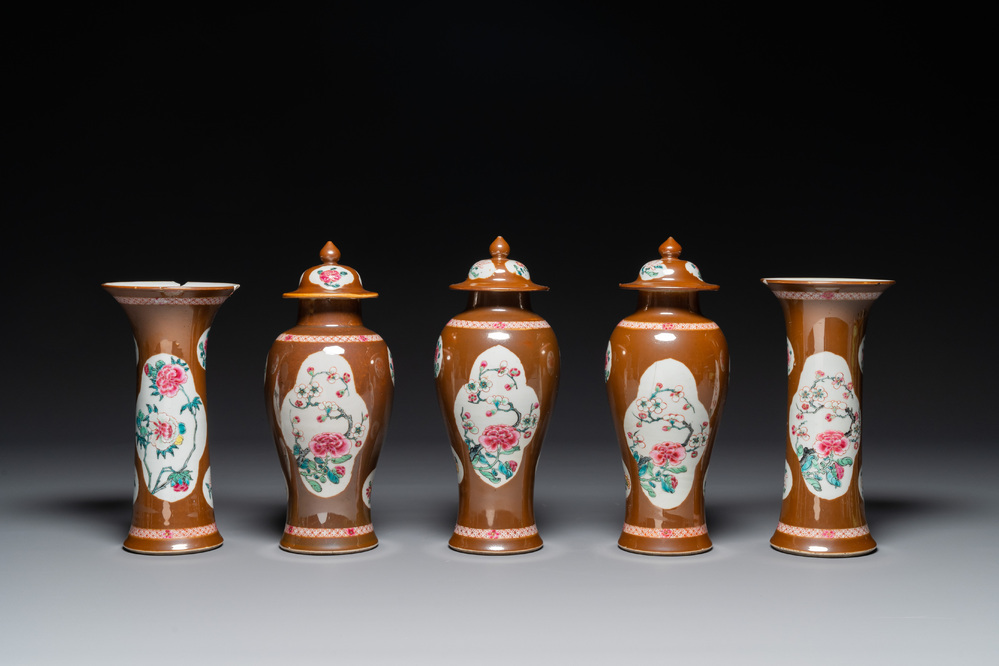 A Chinese capucin-brown-ground famille rose garniture of five vases with floral design, Yongzheng/Qianlong