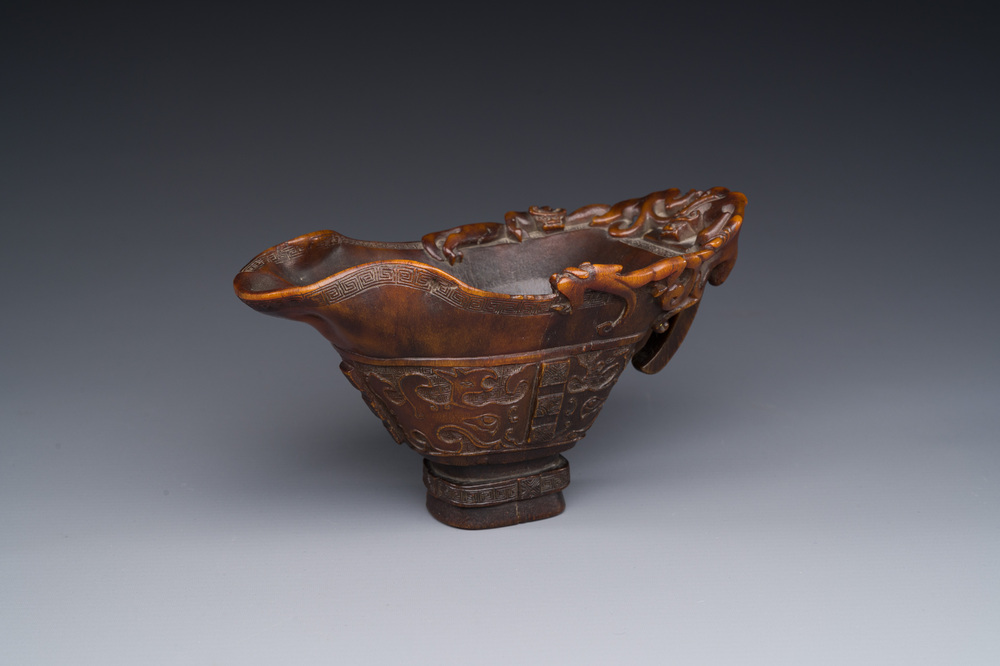 A Chinese carved rhinoceros horn 'libation cup' with chilong design, 17/18th C.