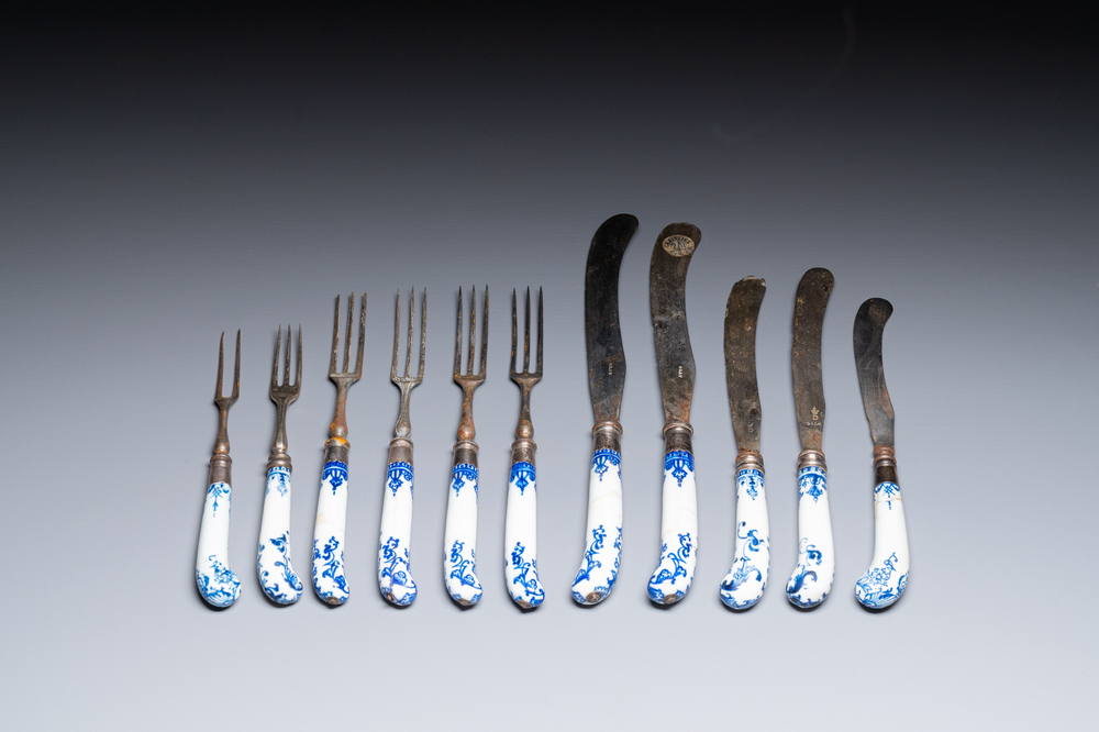Eleven blue and white soft paste porcelain knife and fork handles, probably Saint-Cloud, France, 1st half 18th C.