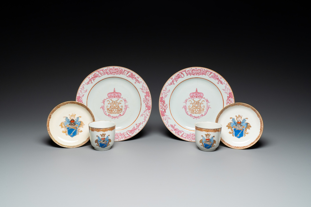 A pair of monogrammed Chinese puce-enamelled plates and a pair of armorial cups and saucers, Yongzheng/Qianlong