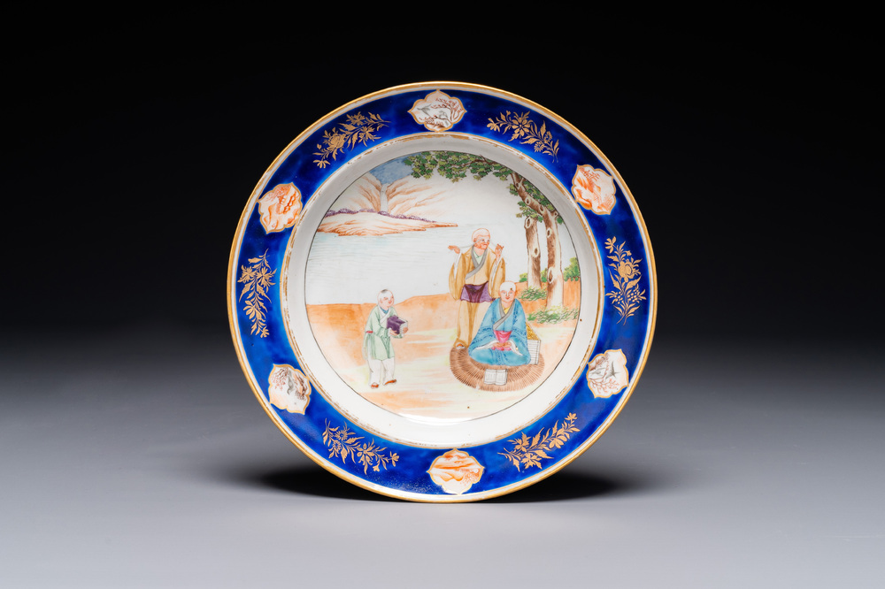 A rare Chinese Canton famille rose plate with a blue-glazed border, 19th C.
