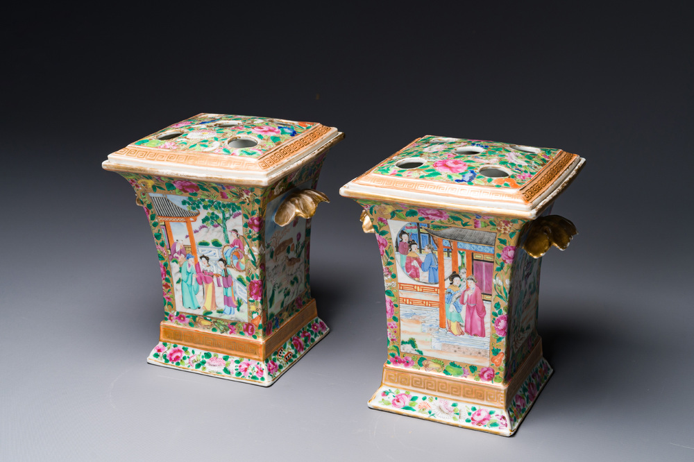 A pair of Chinese Canton famille rose bough pots and covers, 19th C.