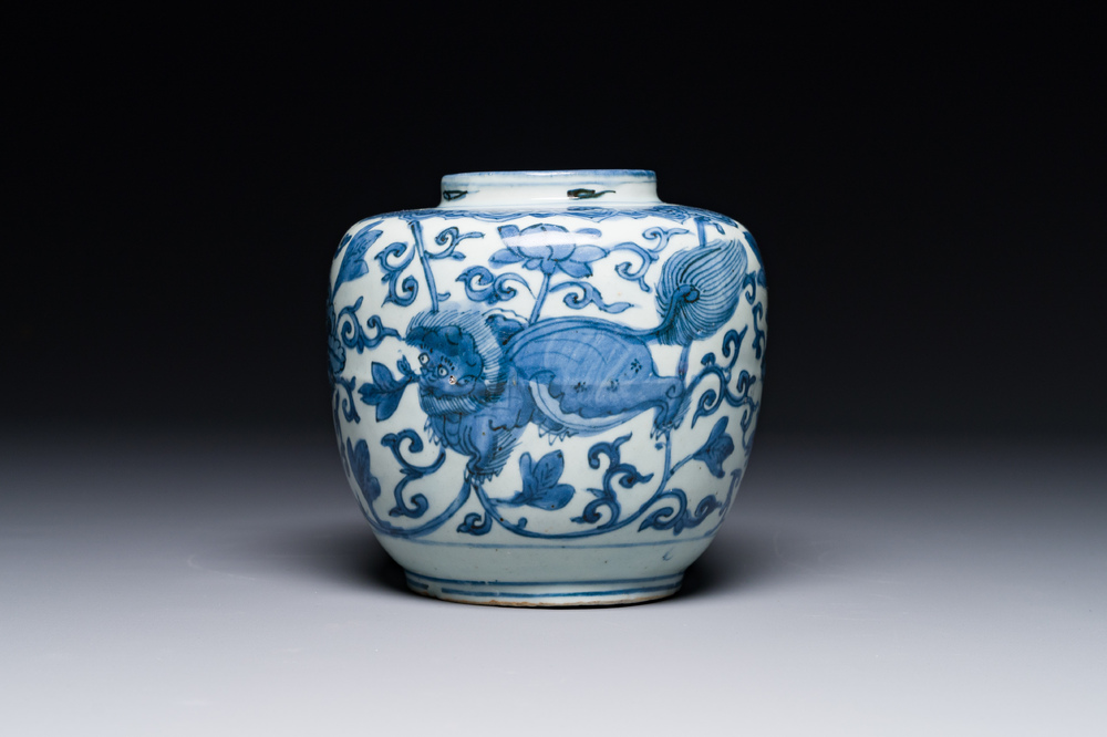 A Chinese blue and white 'Buddhist lion and lotus scroll' jar, Wanli