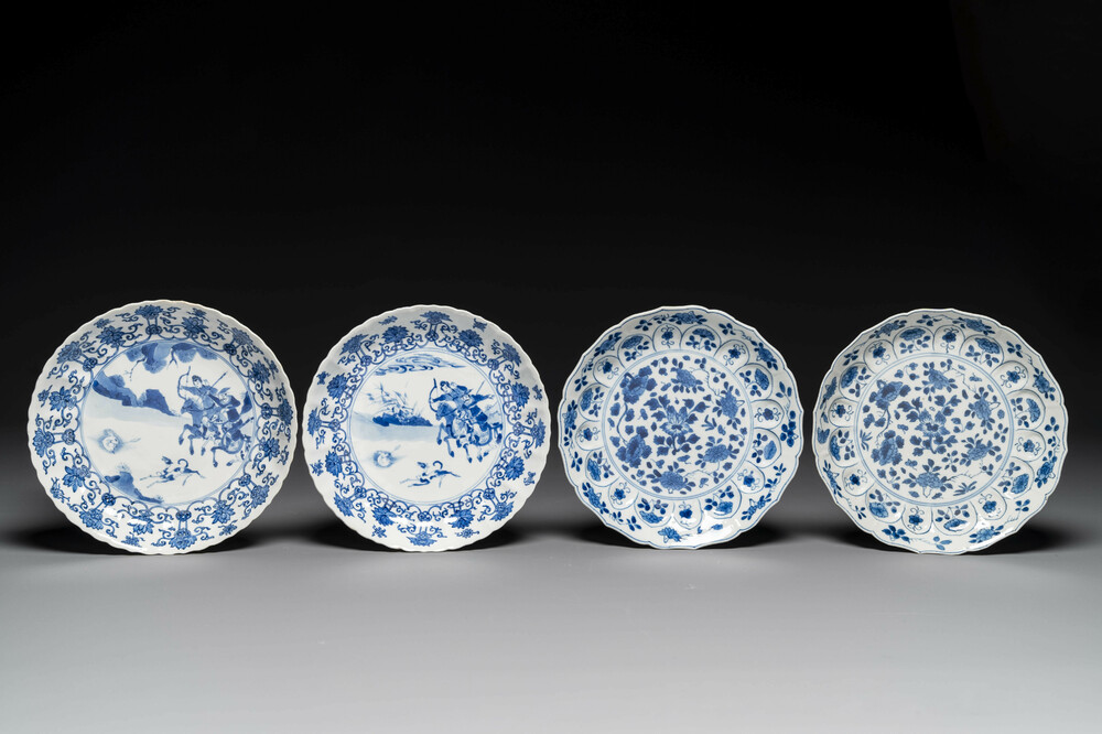 A pair of Chinese blue and white 'Mongolian hunting scene' plates and a pair of plates with floral design, Chenghua and Kangxi mark, Kangxi