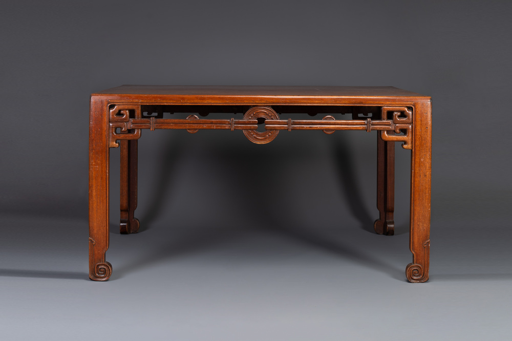 A large rectangular Chinese huanghuali wooden table, 19/20th C.