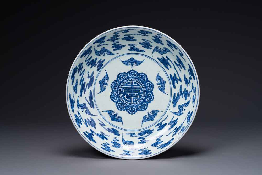 A large Chinese blue and white 'bats and longevity' dish, 19th C.